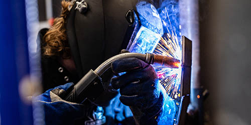 Close-up of student welding