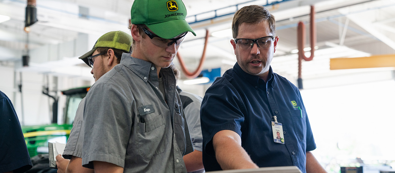 NICC John Deere TECH instructor Matt Johnson with student_featured