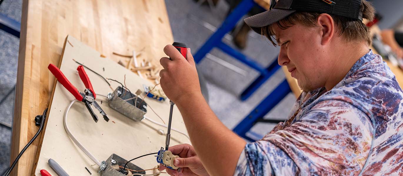Electrician student at work