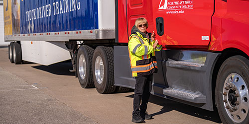 Person stands outside NICC semi