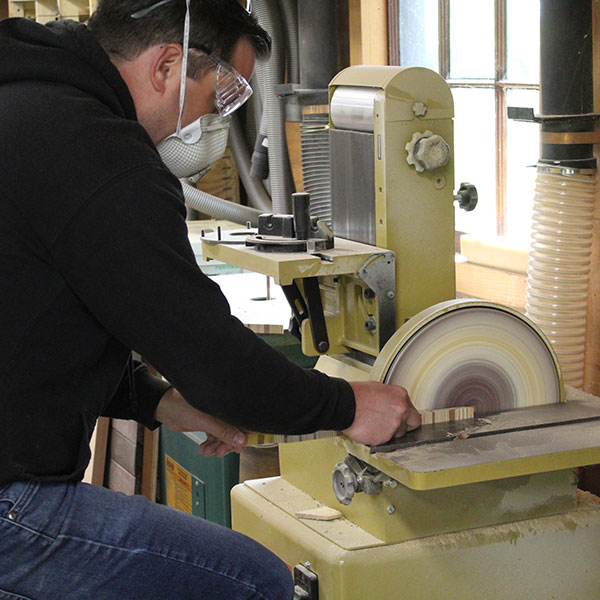 Student working with a table saw