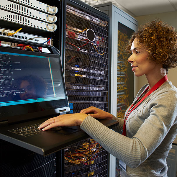 Female works at a computer system