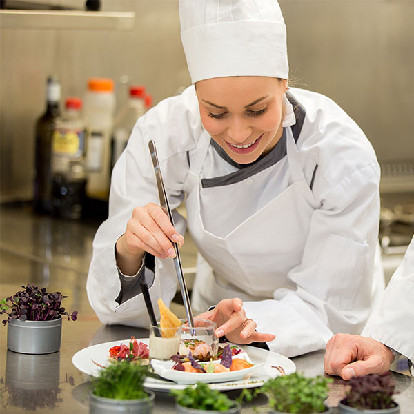 Female chef working in a kitchen