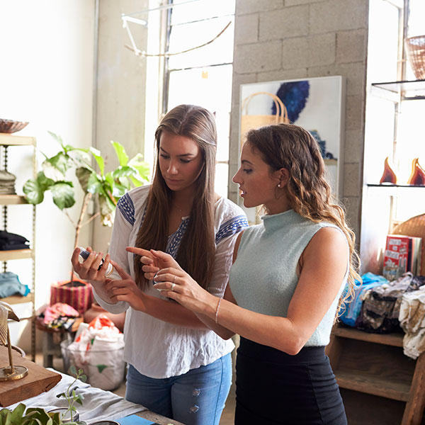 Business owner speaking to a customer