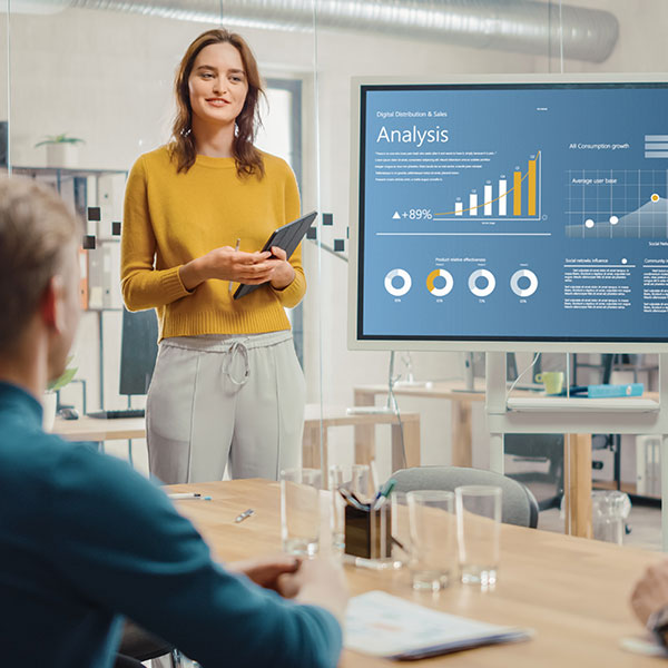 Businesswoman presents data in a meeting