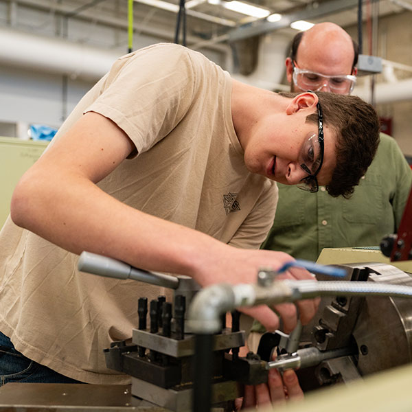 Student working with instructor