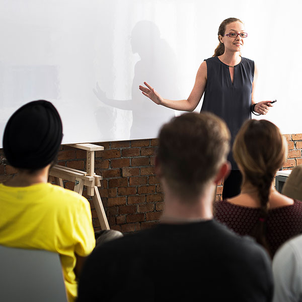 Female business woman in a meeting room