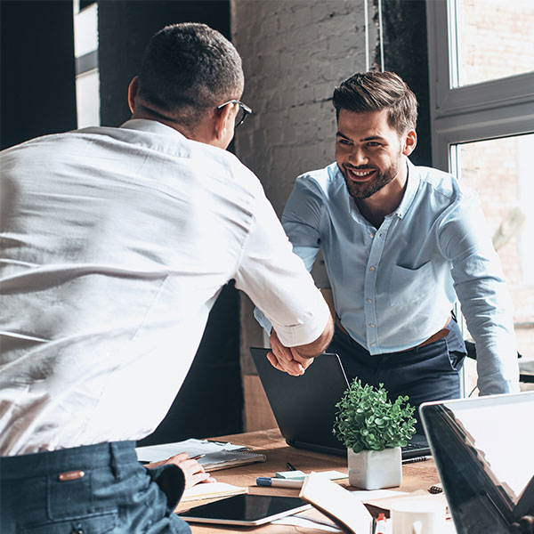 Two businessmen shaking hands