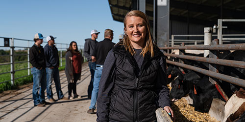 NICC student poses by the Beef barn