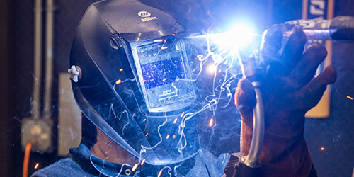 Welding student practices in the lab.