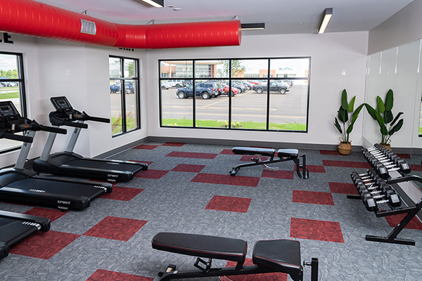 view of the fitness center in College Suites